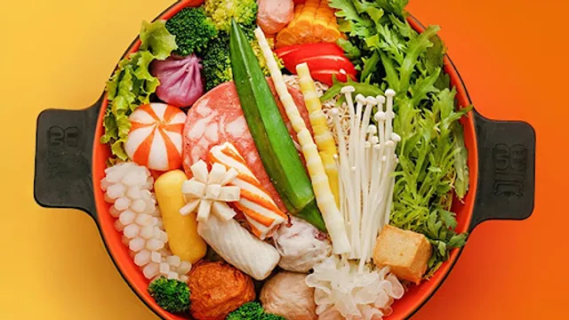 Colourful malatang bowl with vegetables and seafood
